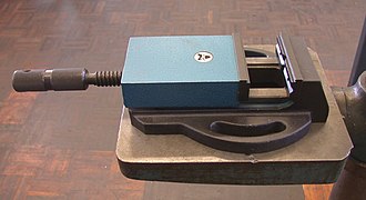 A small machine vise used in a drill press