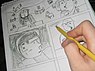 Künstler beim Zeichnen eines Comics