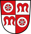 Stadt Miltenberg Geviert von Rot und Silber; in Feld 1 und 4 ein sechsspeichiges silbernes Rad; in Feld 2 und 3 der rote Buchstabe M