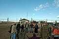 Lois Gibbs joins a circle of mine opponents to sing, pray and strategize at the entrance to the Kennecott Minerals sulfide mine that is being built near Lake Superior close to Big Bay, MI