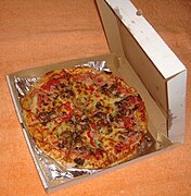 Take-out pizza in a die-cut folder