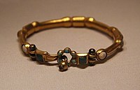 Gold bracelet from the tomb, probably imported from India.[8] National Museum of China