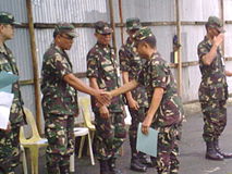 QC Reservists receive their certificates from COL Danilo P Gomez QMS (GSC) PA; 1302CDC Commanding Officer.