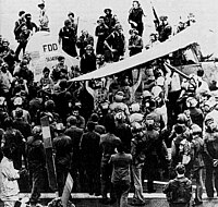 Midway deck crew surround Major Buang and his family