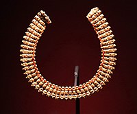 Necklace made of 54 composite human head and ram's head gold pendants with a small carnelian bead between each. Meroitic Period, 270–50 BC