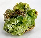 Apple green pyromorphite cluster on limonite matrix