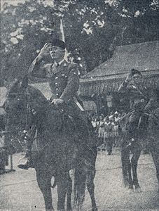 Sukarno riding horse at Army celebration (1946)