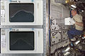 NASA Image: ISS013E64639 - Image on the right shows NASA ISS Science Officer, Jeff Williams inserting one of the POEMS samples into the MELFI freezer. Image on the left shows ground control and a flight sample of bacteria cultures growing through the solid media agar, and scientists can sample the genetic changes across multiple generations by sampling different places in the growth medium.