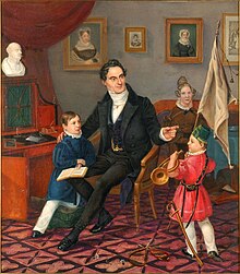 Um 1835: Ölgemälde von Karl Reinecke in seinem im Stil der Biedermeierzeit eingerichteten Wohnzimmer im Haus Schmiedestraße 197 mit seinen beiden Söhnen, im Hintergrund die Ehefrau
