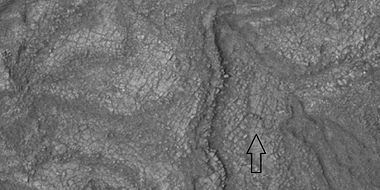 Surface breaking up into cube-shaped blocks, as seen by HiRISE under HiWish program