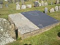 Original grave slab for Governor John Cranston on left, and newer slab for both him and his son, Governor Samuel Cranston, on right