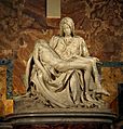 Michelangelo's Pietà, 1498–99, shows Mary holding the dead body of Jesus