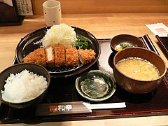 Tonkatsu served with shredded cabbage, boiled rice and miso soup in Sapporo, Hokkaido, Japan