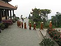 Monks of the Trúc Lâm school of Buddhism of Tây Thiên Zen Monastery are on their way to the cafeteri
