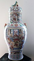 19th century porcelain vase with cover painted with overglaze enamels and gilding Canton or Guangdong province, in southern China. This type of ware, known for its colourful decoration that covers most of the surface of the piece, was popular as an export ware. On the backside of the porcelain vase a military general depicted in front of a walled city gate has a banner with the surname "Ma". Romance of the Three Kingdoms