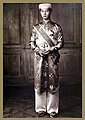 Crown prince Bảo Long in traditional Ao Dai.