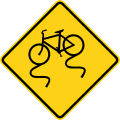 W8-10 Bicycle slippery when wet ahead