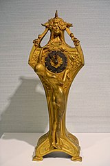 Flowers and plants (in this case poppies and sunflowers) – Mantel clock, by Louis Chalon, E. Colin & Cie. (c. 1900), Hessisches Landesmuseum Darmstadt, Germany