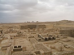 Field of restored walls and ruins in the desert