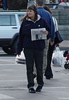A street newspaper vendor, selling Street Sheet, in San Francisco