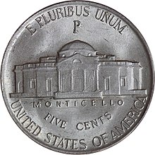 A silver coin with an image of Monticello in the middle. Text at the top says "E Pluribus Unum" and text on the bottom says "Monticello", "Five Cents" and "United States of America".