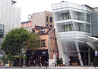 #35: The modest building on the left was owned in the early 19th century by a great-grandson of Peter Stuyvesant.[21] It was demolished for new construction.