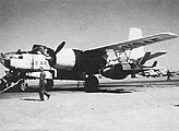 A Ryan Q-2A Firebee target drone under the wing of a 4750th ADS DB-26C launch aircraft at Yuma in 1956. Operations with the Q-2A drone began at Yuma in January 1956.