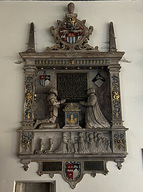 Monument showing the kneeling figures of James Altham, his wife, and their 11 children.