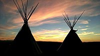 Sunset with tepees on the Wind River Indian Reservation