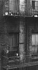 Consuelo Kanaga, Untitled (Tenement, Child on Fire Escape, New York), mid-late 1930s. Brooklyn Museum