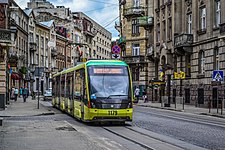 First Electron T5L64 (1179) tram in Ivana Franka street in Lviv