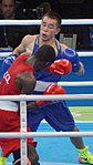 Olympiasieger Hasanboy Doʻsmatov (blau) im Finale gegen den Kolumbianer Yuberjen Martínez