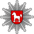 Niedersächsisches Wappen im Polizeistern mit Sachsenross als trojanischem Pferd