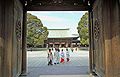 Priests and maidens wear traditional dress in preparation for a wedding at Meiji Shrine