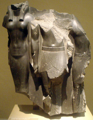 Fragmentary statue triad of Menkaura flanked by the goddess Hathor (left) and a male nome god (right), Boston Museum of Fine Arts.