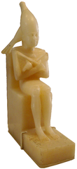 Smooth yellow statue of a seated king in a tight robe