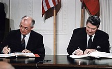 Mikhail Gorbachev and Ronald Reagan signing the Intermediate-Range Nuclear Forces Treaty in the East Room, December 1987