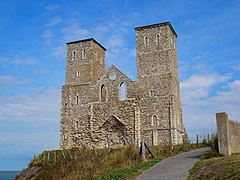 Looking up at Reculver towers from close by on a sunny day