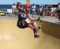 A skateboarder in mid flight performing a trick in Australia (2012)