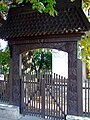 A carved Székely gate