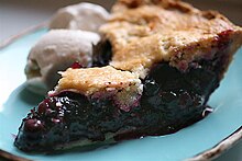A slice of blueberry pie
