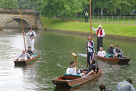 The Olympic torch being punted down the river during the 2012 Summer Olympics torch relay