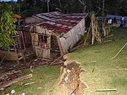 Destroyed home in Catigbian and ground rupture