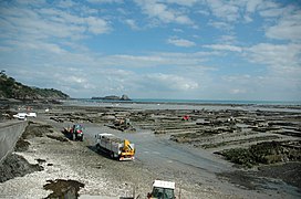 Harvesting oysters from the pier at Cancale, Brittany, France 2005