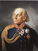 Painting shows a balding man wearing a dark blue military uniform with a gold collar and gold braid on his right shoulder. He wears the Iron Cross and Pour le Mérite awards.