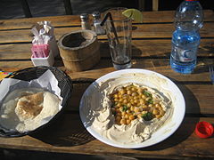 Hummus platter served with pide near Jaffa in Tel Aviv