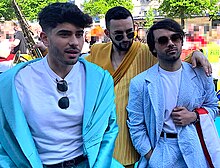 The Busker at the Eurovision Turquoise Carpet in 2023; from left to right: Meilak, Meachen, and Borg