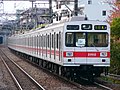 Set 2102 on the Den-en-toshi Line, with original roller blind destination indicators and no front end skirt, November 2004