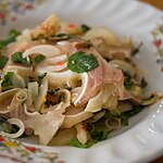 Yam hu mu is a spicy Thai salad made with slices of boiled pig's ears.