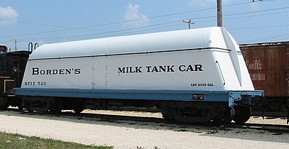 A milk tank car for bulk loading.